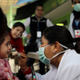 A nurse checks a girl at the Francisco Kino school, which was turned into a temporary shelter after an earthquake hit Mexico City, Monday, Sept. 19, 2017. Photo: AP